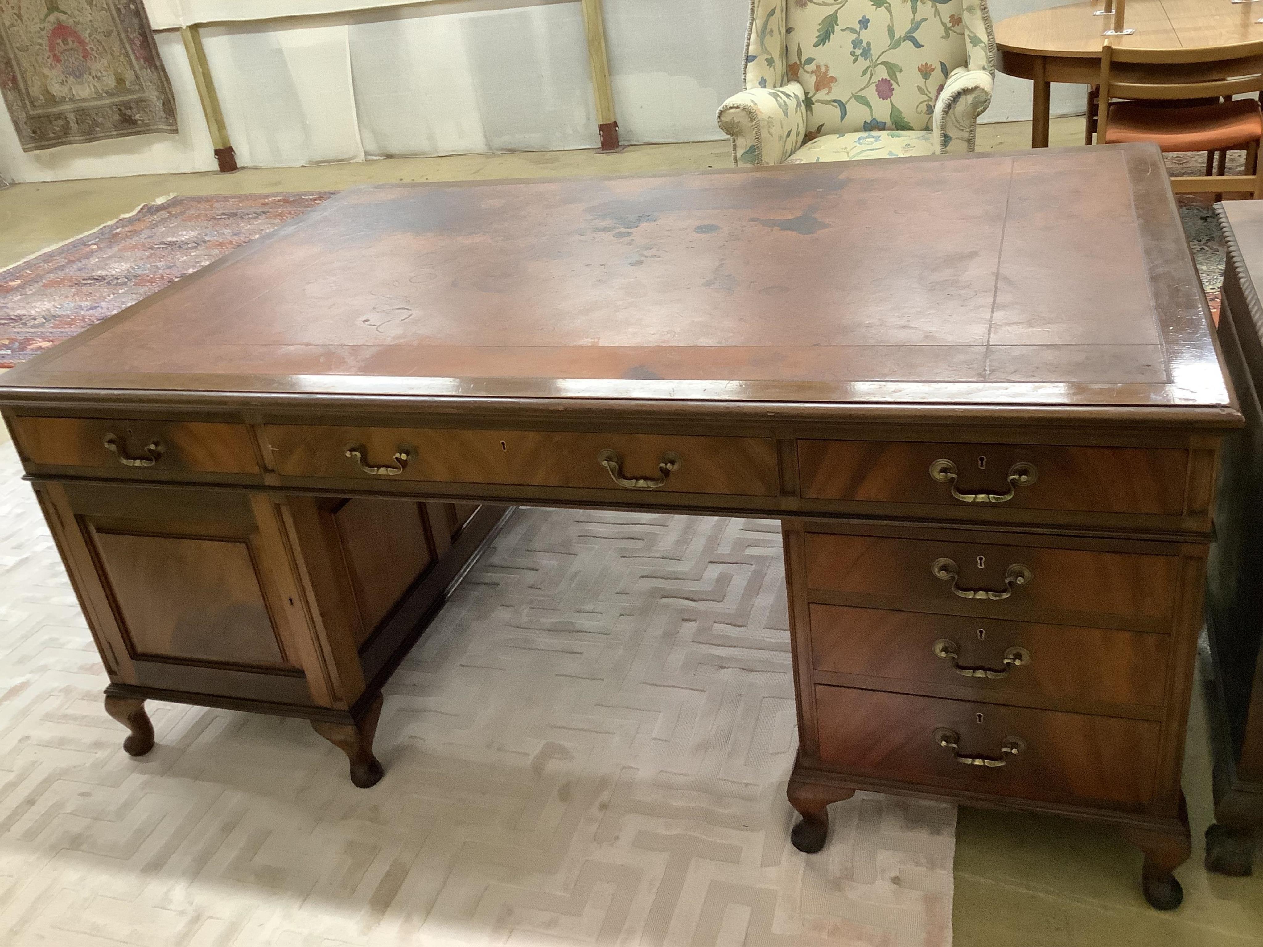 An early century George III style mahogany pedestal partner's desk, width 183cm, depth 122cm, height 78cm. Condition - fair